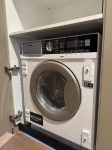 a washer and dryer in a room at New Eurovea Tower in Bratislava