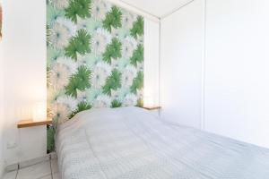 Postel nebo postele na pokoji v ubytování Appartement Canet plage front mer