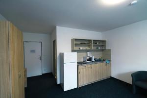 Kuchyň nebo kuchyňský kout v ubytování Apartmány Plzeň Zborovská 22 a