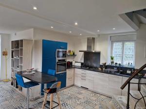 Kuchyň nebo kuchyňský kout v ubytování Coeur de Reigny