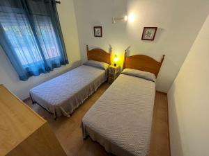 Posteľ alebo postele v izbe v ubytovaní Chalet adosado Cargador Altamar