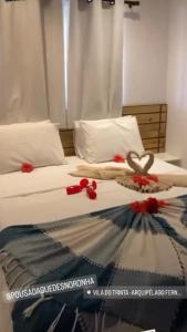 Кровать или кровати в номере Pousada Guedes Noronha