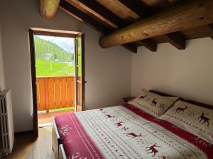 Postel nebo postele na pokoji v ubytování Hotel Miramonti