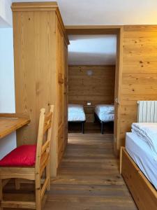Postel nebo postele na pokoji v ubytování Hotel Miramonti