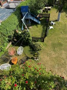 an aerial view of a garden with tennis rackets and flowers at Pokoje gościnne EWELA in Łeba