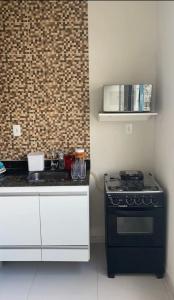 Η κουζίνα ή μικρή κουζίνα στο Apartamento em Arcoverde 05