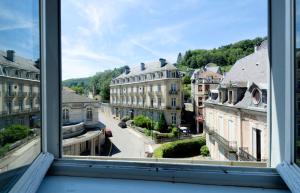 a view of a city from a window at Tradition Plombières in Plombières-les-Bains