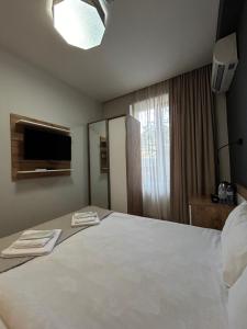Katil atau katil-katil dalam bilik di 10 KEYS Boutique Hotel