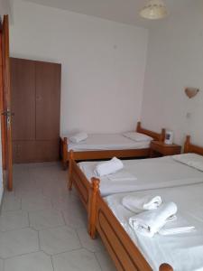 Ένα ή περισσότερα κρεβάτια σε δωμάτιο στο Anthula Apartments