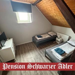 Postel nebo postele na pokoji v ubytování Pension und Monteurzimmer Schwarzer Adler
