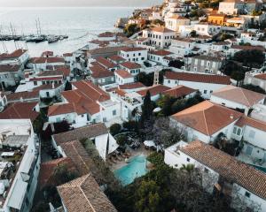 an aerial view of a town next to the ocean at Bratsera Boutique Hotel in Hydra