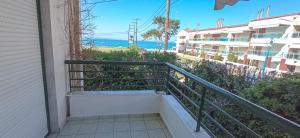 a stairway with a view of the ocean at THALASSA - 2 Bedroom seaside appartment in Polychrono