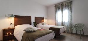 Postel nebo postele na pokoji v ubytování Casa La Oliva + 41 fotografií