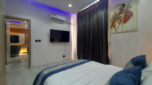 Ένα ή περισσότερα κρεβάτια σε δωμάτιο στο Seaview Apartment, Ikoyi