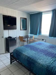 TV a/nebo společenská místnost v ubytování AIRE Hotel North Beach Jersey Shore
