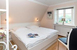 En eller flere senge i et værelse på LITZKOW 15506