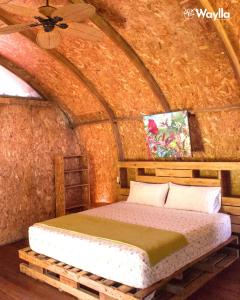 Uma cama ou camas num quarto em Waylla Eco Refugio