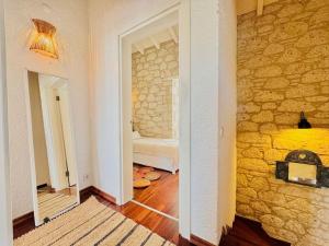 Postel nebo postele na pokoji v ubytování Alaçatı Köyiçi Agrilia House