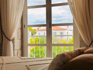 Posezení v ubytování Alaçatı Köyiçi Agrilia House