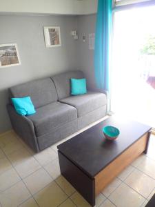 Posezení v ubytování Appartement vue sur le Golf Marina de Saint François