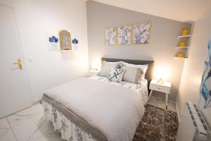 Postel nebo postele na pokoji v ubytování Appartement Royale 2 Pièces de 35 m2