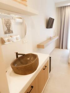 Koupelna v ubytování Akrogiali