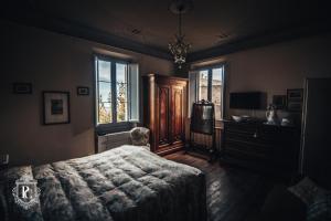 Postel nebo postele na pokoji v ubytování Palazzo Capparucci - Dimora storica