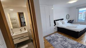 Postel nebo postele na pokoji v ubytování Apartment Lana 602