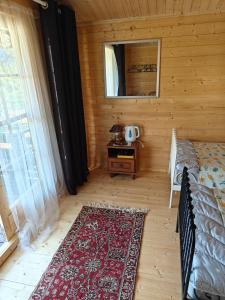 Postel nebo postele na pokoji v ubytování Kalmaküla kämpingud