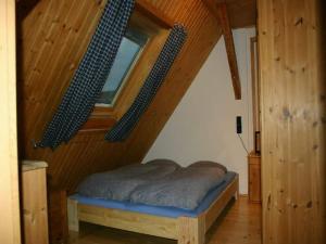 A bed or beds in a room at Appartement Lehen