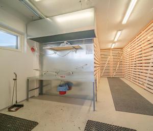 a room with a table with a surfboard on it at Porokello, Ylläsjärvi, 2 mh in Ylläsjärvi +38 photos