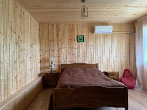 Ένα ή περισσότερα κρεβάτια σε δωμάτιο στο Guesthouse SANIKO