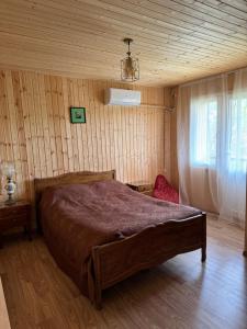 Ένα ή περισσότερα κρεβάτια σε δωμάτιο στο Guesthouse SANIKO