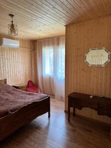 Ένα ή περισσότερα κρεβάτια σε δωμάτιο στο Guesthouse SANIKO