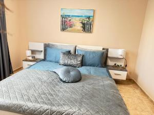 Postel nebo postele na pokoji v ubytování MaYana Beach Appartament + 23 fotografií