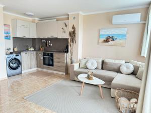 Kuchyň nebo kuchyňský kout v ubytování MaYana Beach Appartament