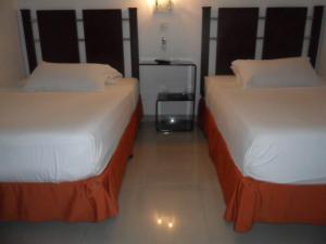 Ένα ή περισσότερα κρεβάτια σε δωμάτιο στο Hotel Calima Real