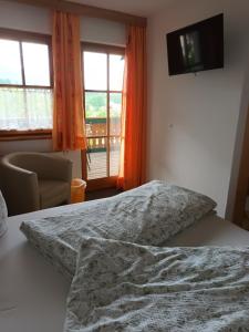Łóżko lub łóżka w pokoju w obiekcie Landhaus Ebner