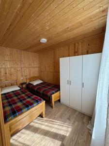 Ένα ή περισσότερα κρεβάτια σε δωμάτιο στο Guesthouse SANIKO