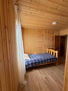 Ένα ή περισσότερα κρεβάτια σε δωμάτιο στο Guesthouse SANIKO