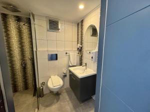Ванная комната в ERDEM HOTEL