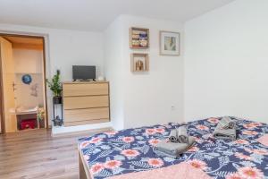 Postel nebo postele na pokoji v ubytování Dům č. 28