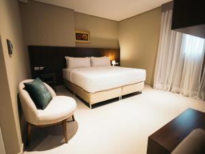 Zielo Hotel tesisinde bir odada yatak veya yataklar
