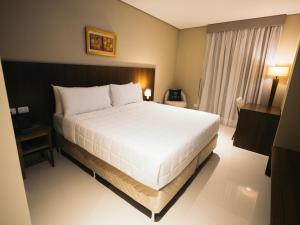 Zielo Hotel tesisinde bir odada yatak veya yataklar