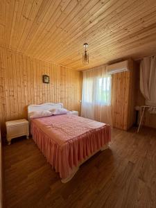 Ένα ή περισσότερα κρεβάτια σε δωμάτιο στο Guesthouse SANIKO
