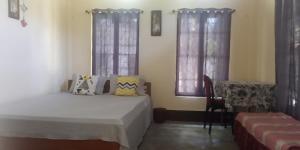 Postel nebo postele na pokoji v ubytování Best Homestay