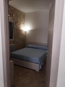 Ένα ή περισσότερα κρεβάτια σε δωμάτιο στο Casa Paola