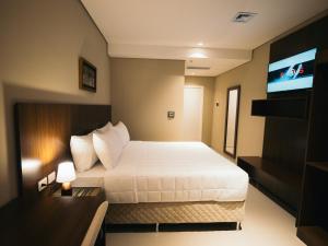 Zielo Hotel tesisinde bir odada yatak veya yataklar