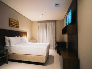 Zielo Hotel tesisinde bir odada yatak veya yataklar