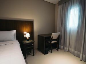 Zielo Hotel tesisinde bir odada yatak veya yataklar